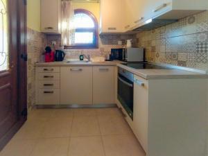 A kitchen or kitchenette at Sundays Family House/Studio Még 23 kép