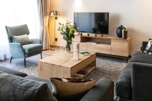 TV a/nebo společenská místnost v ubytování Alaska Lodge by Alpine Resorts