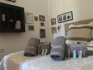 Ένα ή περισσότερα κρεβάτια σε δωμάτιο στο MacGregor Apartment