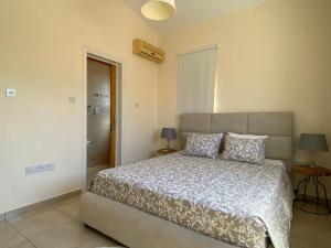 Postel nebo postele na pokoji v ubytování Luxury Villa Phaedra