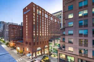 an aerial view of a building in a city at Sheraton Raleigh Hotel in Raleigh