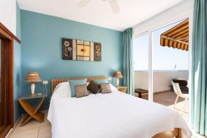 Posteľ alebo postele v izbe v ubytovaní Penthouse Palm Mar