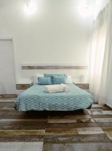 Postel nebo postele na pokoji v ubytování Modernos Apartamentos en Ciudad Jardín Córdoba