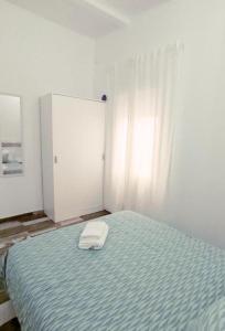 Postel nebo postele na pokoji v ubytování Modernos Apartamentos en Ciudad Jardín Córdoba