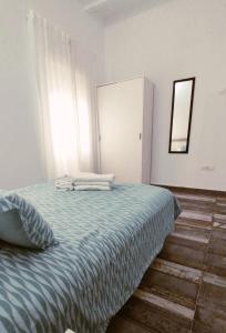 Postel nebo postele na pokoji v ubytování Modernos Apartamentos en Ciudad Jardín Córdoba