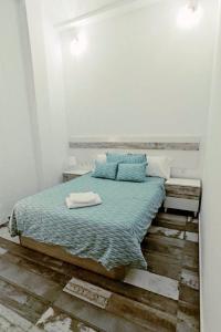 Postel nebo postele na pokoji v ubytování Modernos Apartamentos en Ciudad Jardín Córdoba