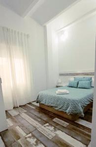 Postel nebo postele na pokoji v ubytování Modernos Apartamentos en Ciudad Jardín Córdoba