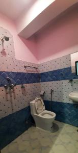 Een badkamer bij The Maple Inn
