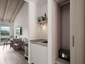 Kuchyň nebo kuchyňský kout v ubytování Residence Caffè Maya