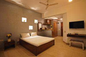 Łóżko lub łóżka w pokoju w obiekcie EKO STAY - Tropical Beach Apartments
