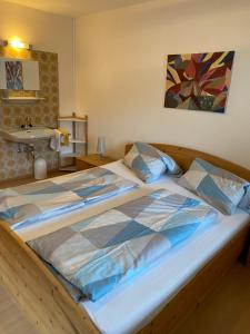 Letto o letti in una camera di Haus Sonnenspitze - Fam. Nessler