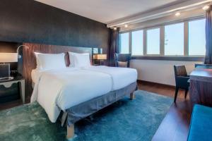 Llit o llits en una habitació de Radisson Blu Hotel, Hamburg