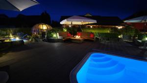 Piscina de la sau aproape de Landgasthof Hubertus - Braugasthof und Wellnesshotel im Allgäu