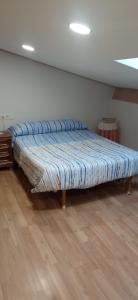 En eller flere senge i et værelse på ático