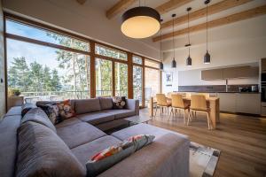Posezení v ubytování Lipno Port Apartment C304 - Lipno Home