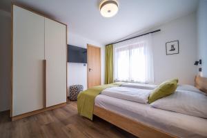 Postel nebo postele na pokoji v ubytování Lipno Port Apartment C304 - Lipno Home