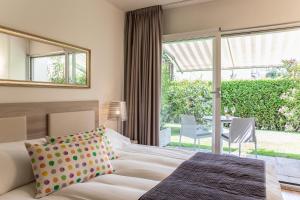 Letto o letti in una camera di Smart-HOTEL MINUSIO, a Swiss Quality Hotel