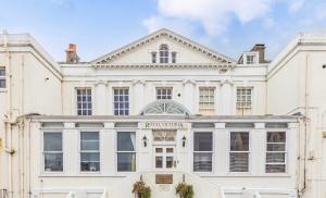 an image of a white building at Little Gem in Swanage