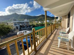 a balcony with a view of a mountain at Tenexia - Mountain View in La Gaulette