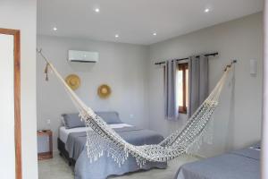 O zonă de relaxare la Pousada Casa du Soleil Camocim