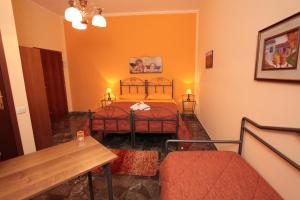 Postel nebo postele na pokoji v ubytování B&B Il Borgodmd
