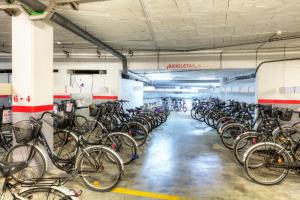 a bunch of bikes parked in a parking garage at Sunway Playa Golf & Spa Sitges in Sitges