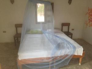 Postel nebo postele na pokoji v ubytování Deep south Eco-lodge