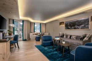 TV a/nebo společenská místnost v ubytování Hotel Seehof Davos