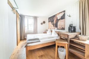 Postel nebo postele na pokoji v ubytování Hotel Kaiserstuhl