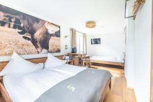 Postel nebo postele na pokoji v ubytování Hotel Kaiserstuhl