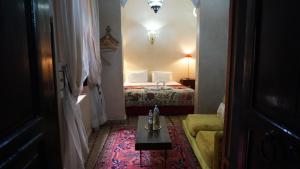 Postel nebo postele na pokoji v ubytování Riad Saba