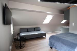 Postel nebo postele na pokoji v ubytování Trolltunga Odda Apartments