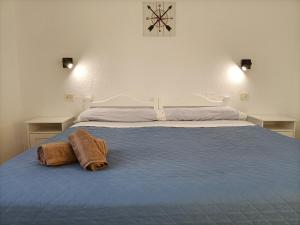 Posteľ alebo postele v izbe v ubytovaní CALIMA Lodge Corralejo