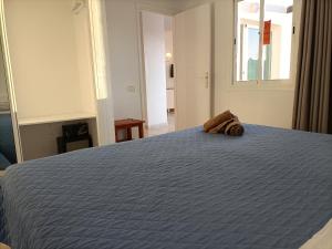 Posteľ alebo postele v izbe v ubytovaní CALIMA Lodge Corralejo