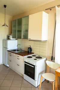 Kuchyň nebo kuchyňský kout v ubytování Brunello Seaside Apartments