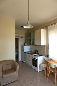 Kuchyň nebo kuchyňský kout v ubytování Brunello Seaside Apartments