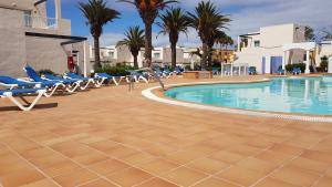 Bazén v ubytovaní CALIMA Lodge Corralejo alebo v jeho blízkosti