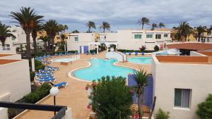 Bazén v ubytovaní CALIMA Lodge Corralejo alebo v jeho blízkosti