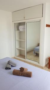 Posteľ alebo postele v izbe v ubytovaní CALIMA Lodge Corralejo