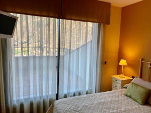 Una cama o camas en una habitación de PROBER_SISCARO