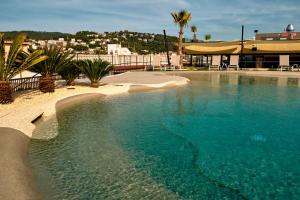 Swimmingpoolen hos eller tæt på Hotel Delfín