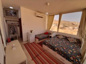 Voodi või voodid majutusasutuse Jordan Guest House toas