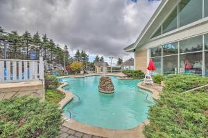 a swimming pool in the backyard of a house at Ski-InandOut Snowshoe Retreat with Resort Amenities! in Snowshoe