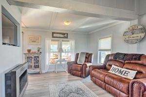 a living room with a couch and chairs and a tv at Seaside SK Getaway Steps to Matunuck Beach! in South Kingstown