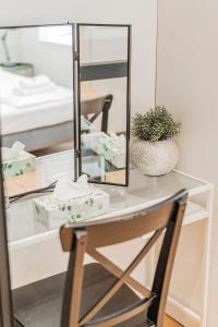 Łóżko lub łóżka w pokoju w obiekcie ZEUS Design Apartments Herz