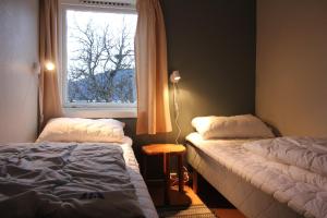 Åndalsnes Hostelにあるベッド
