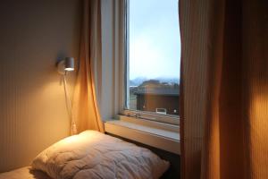 Åndalsnes Hostelにあるベッド