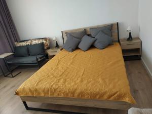 Posteľ alebo postele v izbe v ubytovaní mieszkanie dwupokojowe w Pucku