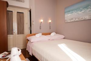 Posteľ alebo postele v izbe v ubytovaní Rooms Goga