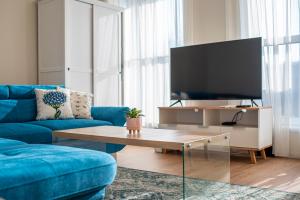 TV a/nebo společenská místnost v ubytování Sun terrace mini penthouse Bestern